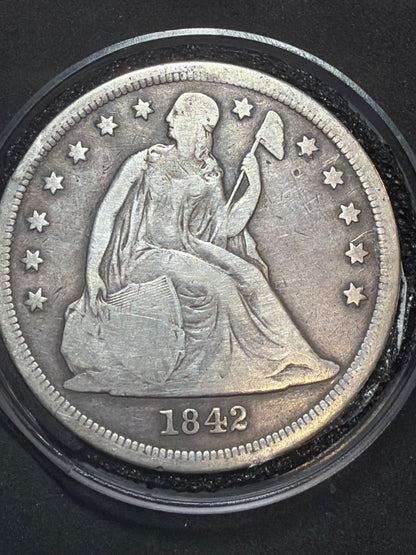 1842 Seated Librty 1 Dollar
