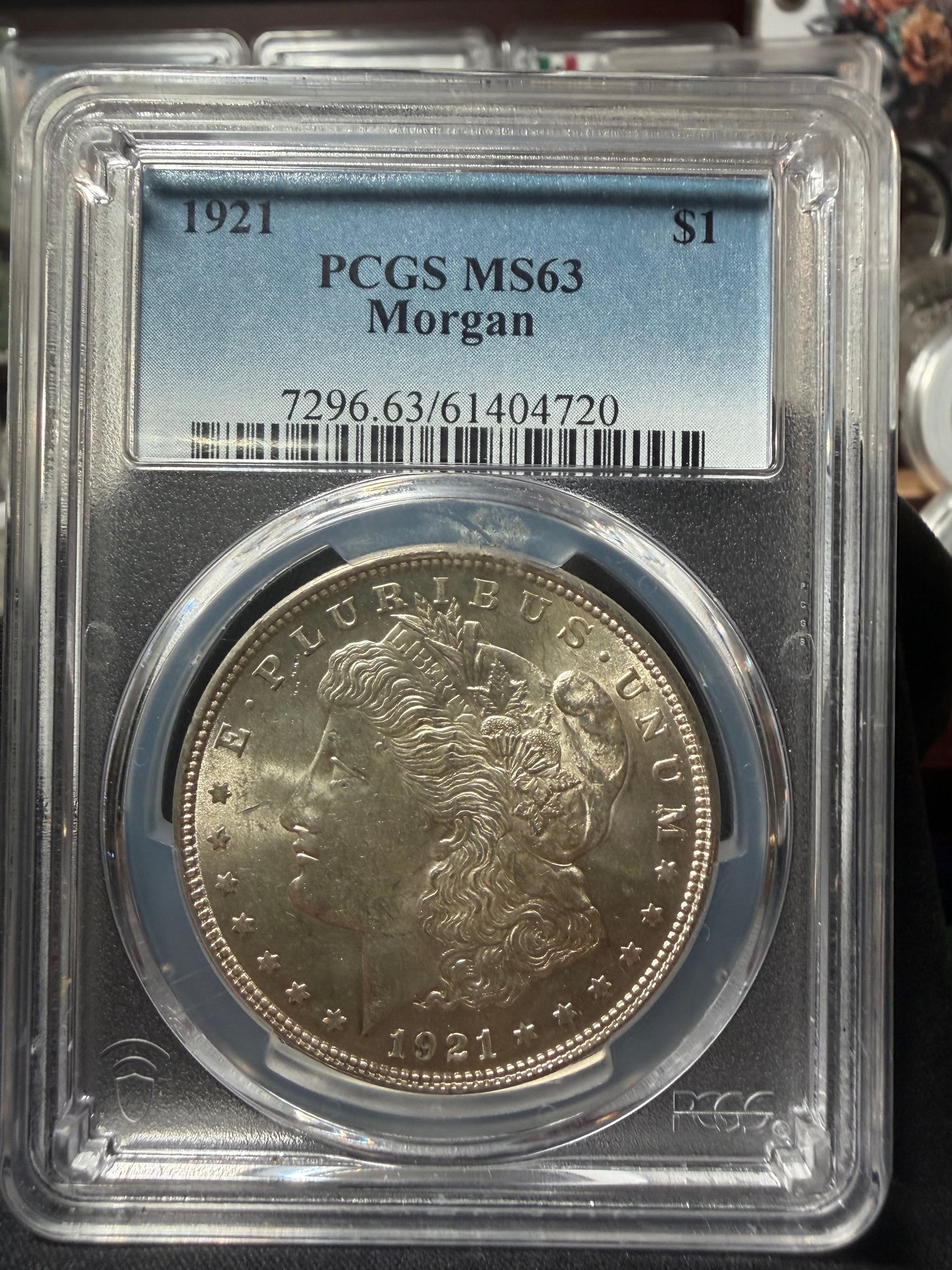 1921 Morgan Silver Dollar PCGS MS63 obverse in slab