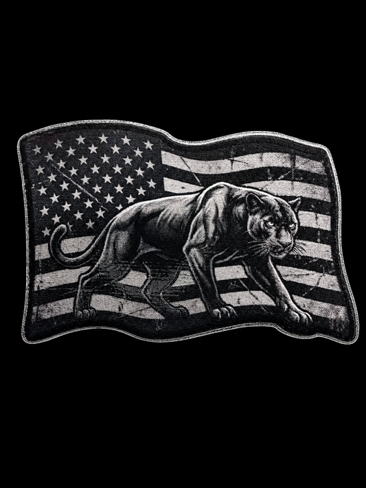 Black panther walking across a distressed grayscale American flag UV decal