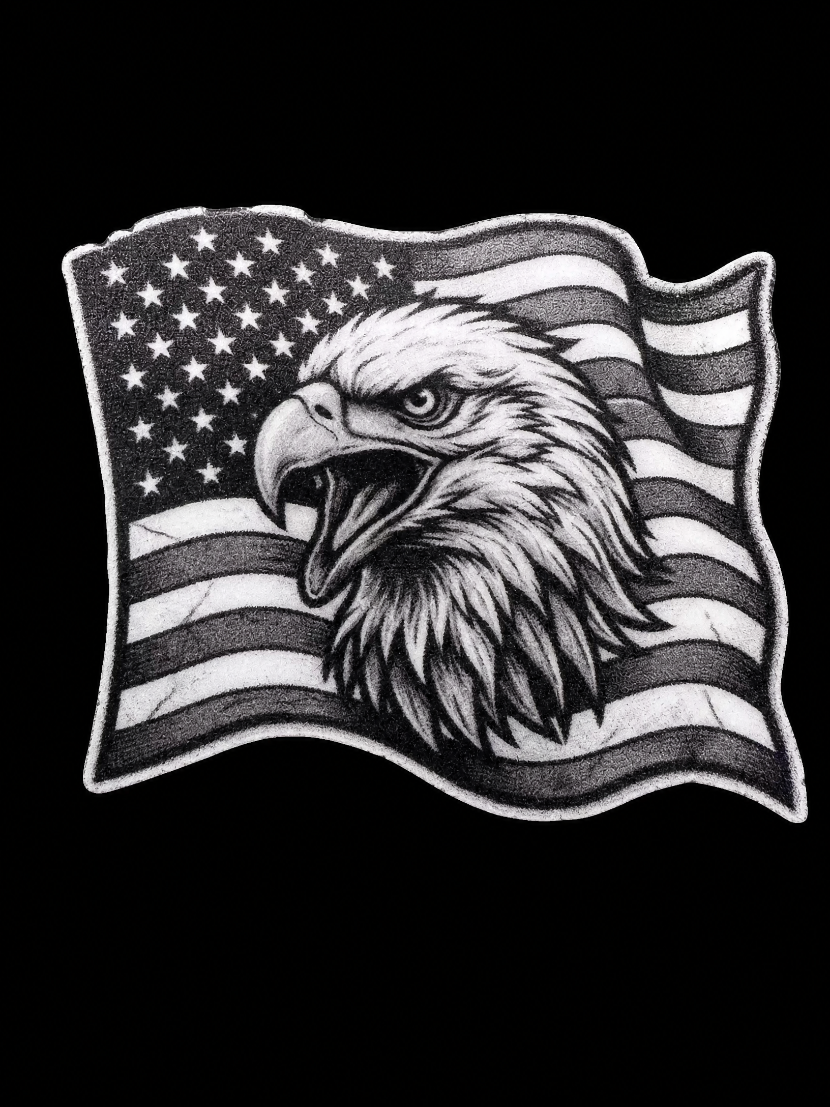 Bald eagle head in front of a distressed grayscale American flag UV decal